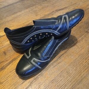 Tod's Black Leather Slip-Ons with White Stitching